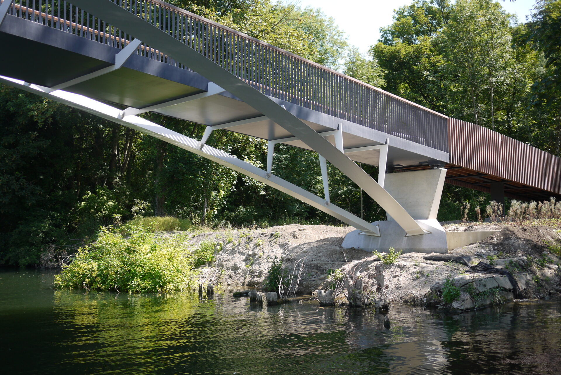 Abutment and parapet view of the footbridge from the river