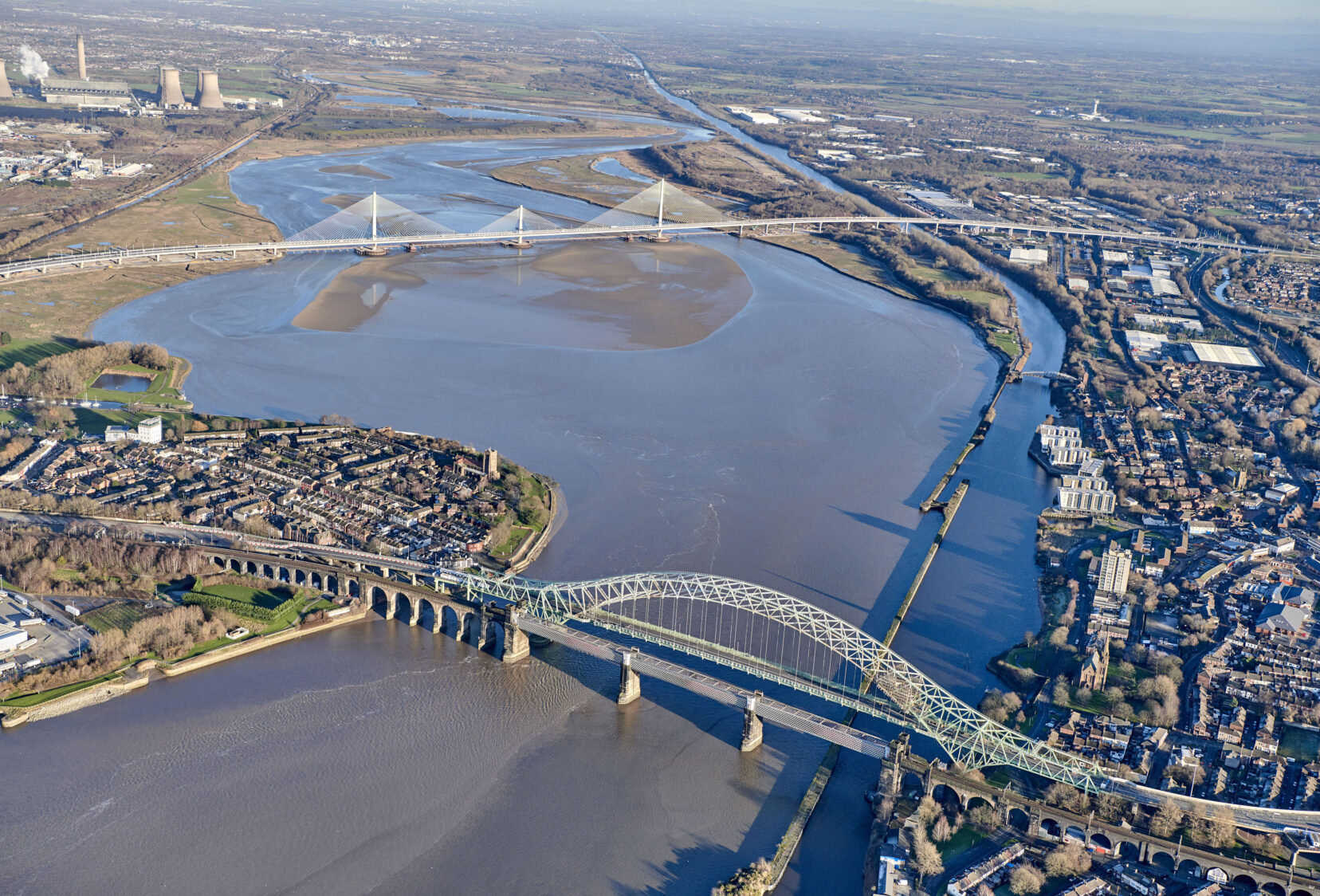 Aerial view with the Gateway bridge to the north and Silver Jubilee bridge to the south