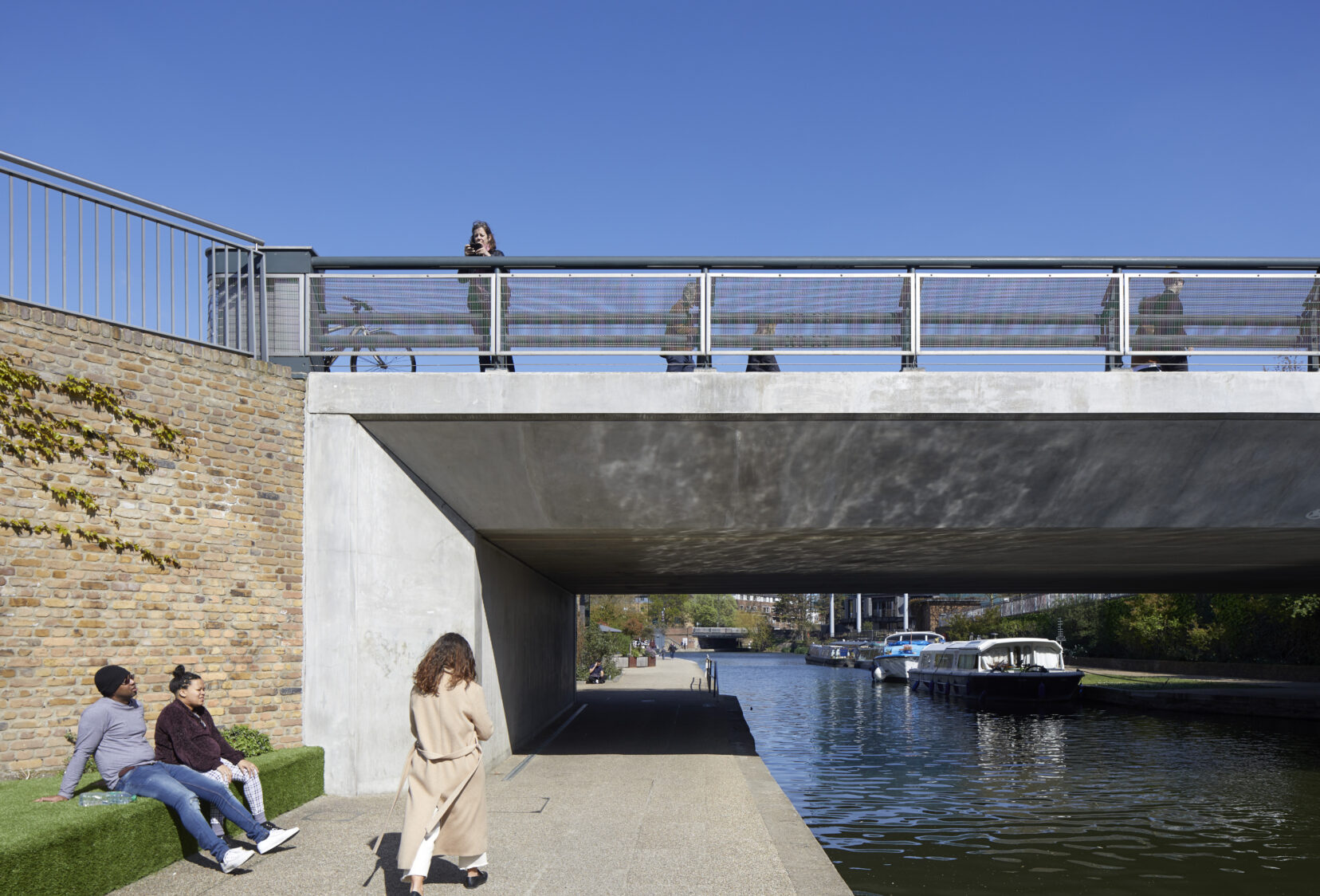 Person walking under Regents Canal Bridge in Kings Cross