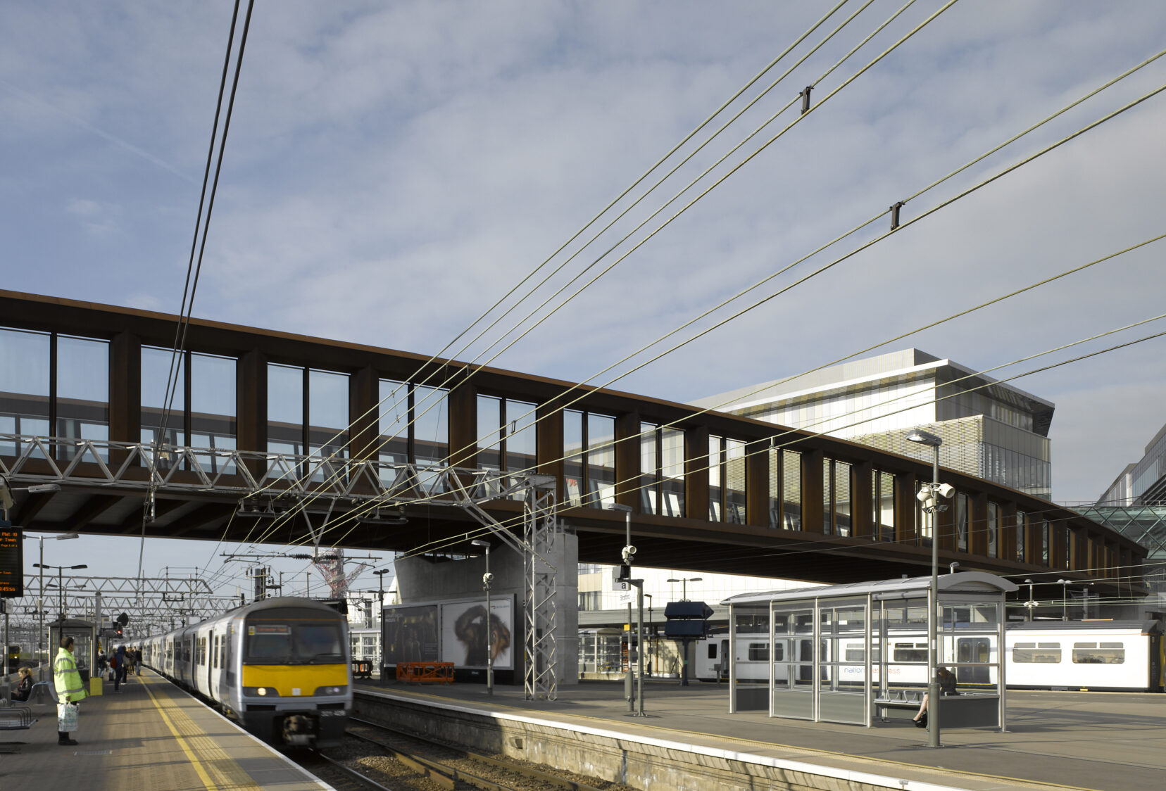 View looking up at Town Centre Link Bridge from station platform below