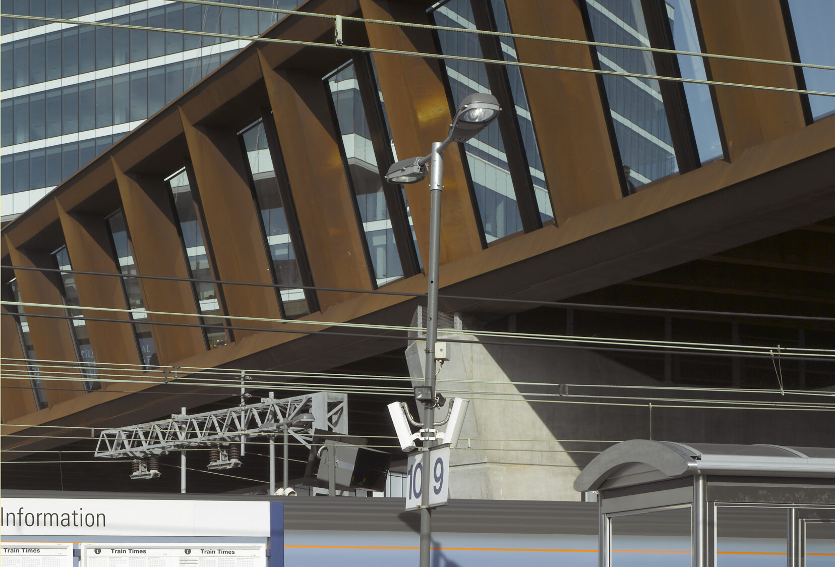 View looking up at Town Centre Link Bridge from station platform below